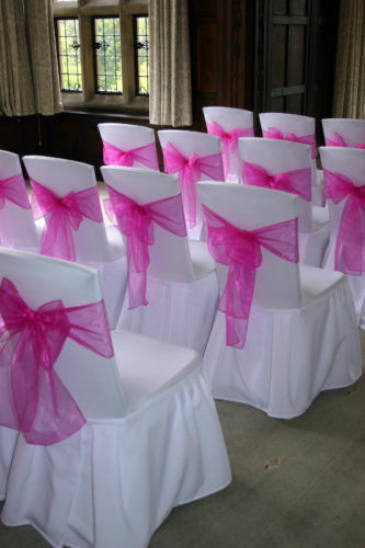 Back view of chair covers and sashes at Fanhams Hall