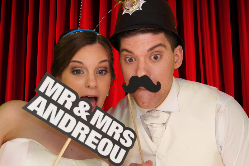 Bride and Groom in our photobooth with personalised sign