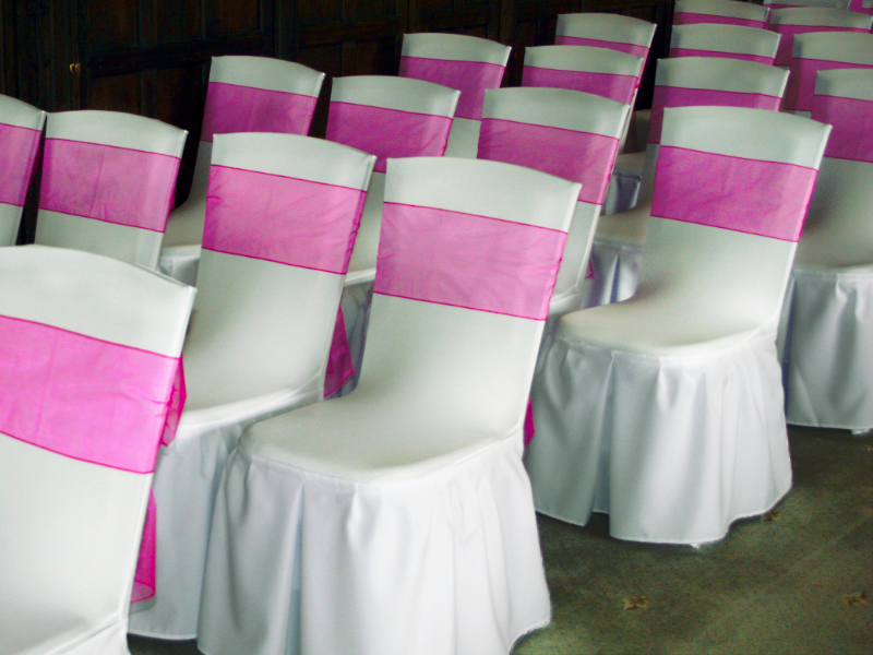 Wedding ceremony chair covers at Fanhams Hall, Ware, Hertfordshire