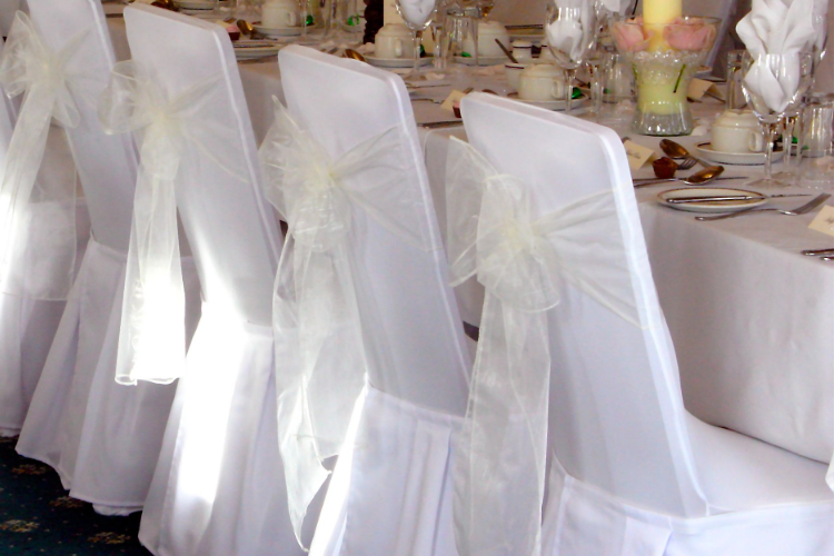 Ivory chair sashes on covers in Sandy, Bedfordshire