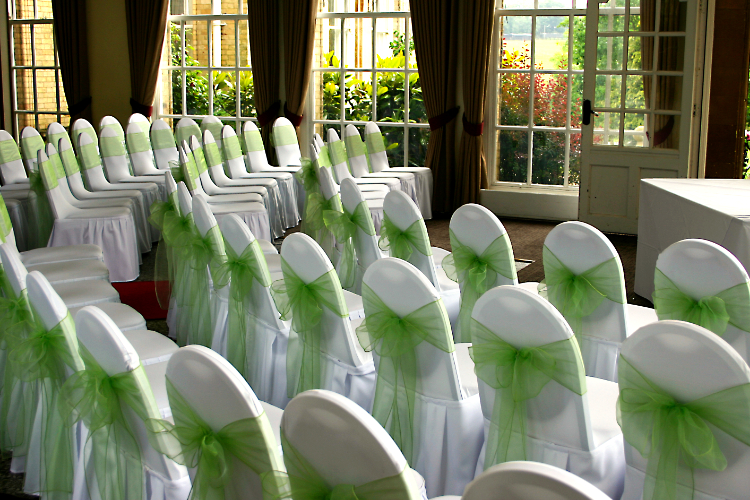 Fitted chair covers fitted for ceremony at Ponsbourne Park, Hertford