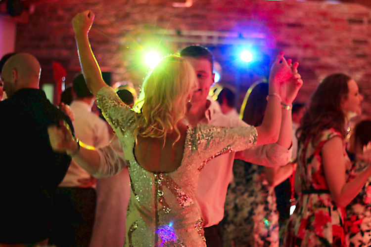 Wedding guests dancing to our DJ, disco and lighting