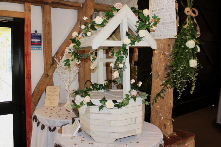Wishing well at a wedding at South Farm, Royston, Herts