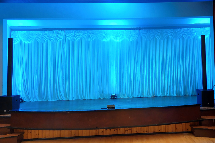 Stage draping with uplighting