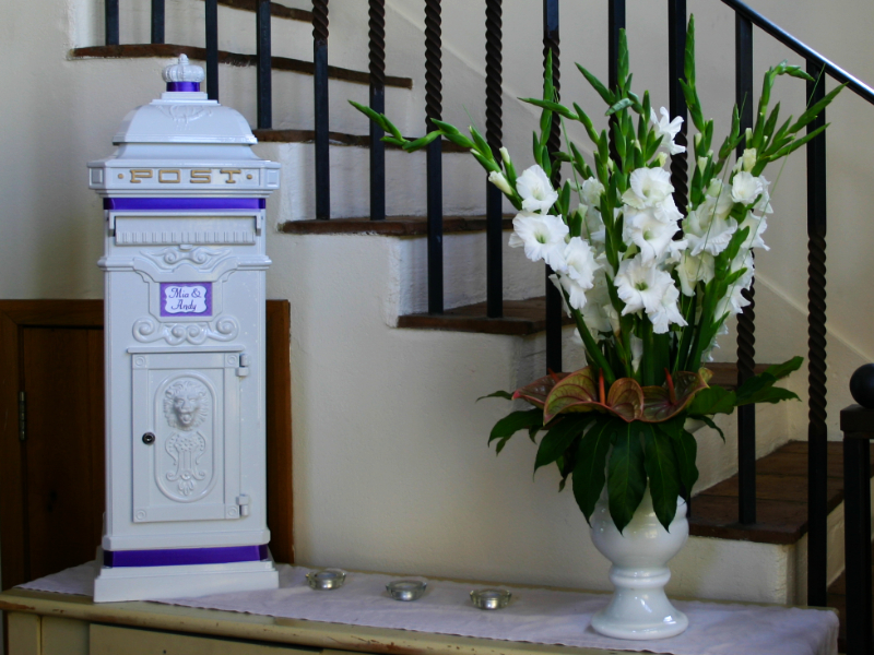White pillar post box at Coltsfoot Country Retreat, Knebworth, Hertfordshire